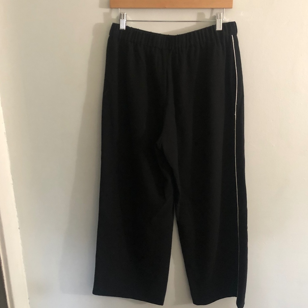 Helene Berman London - black pant with thin white piping.  Size US 10/UK 14